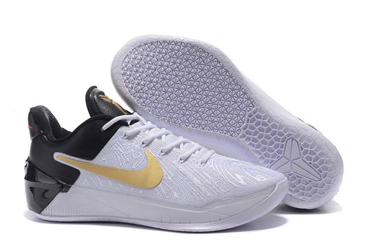 kobe bryant shoes black and gold