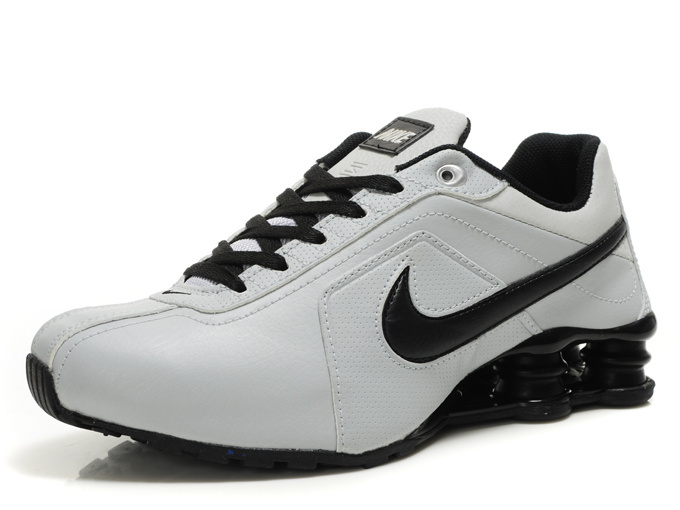 black nike sneakers with white swoosh